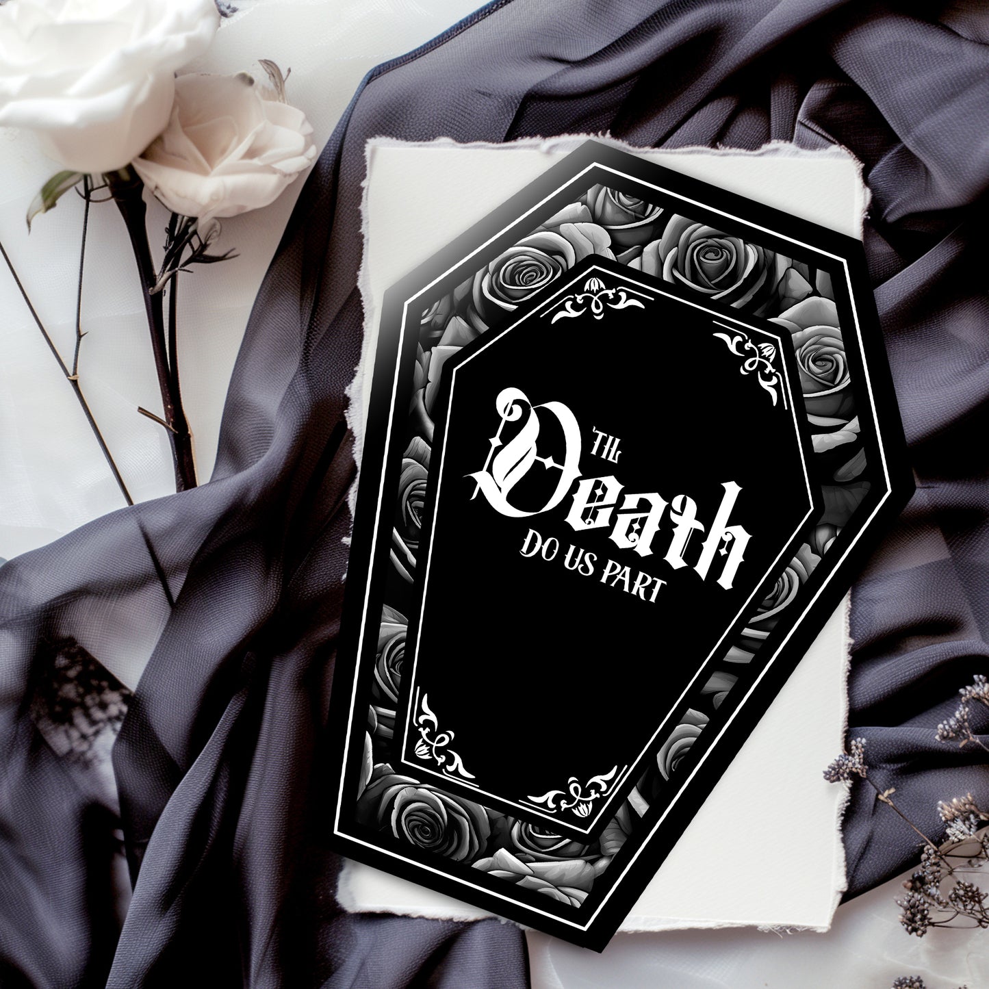 Coffin-shaped gothic wedding or anniversary card with the phrase "Til Death Do You Part" or "Til Death Do Us Part" on a black background, surrounded by monochrome roses. Subtle black and white rose inner print and a black envelope.