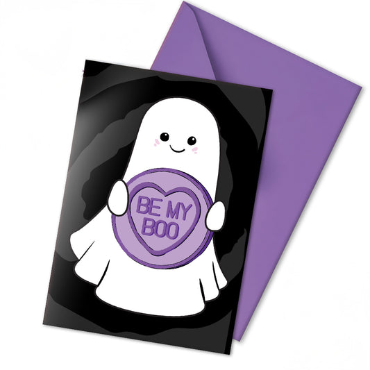 Cute gothic Valentine’s card featuring a smiling ghost holding a purple candy heart that says “Be My Boo” on a black swirl background. Includes a purple envelope.