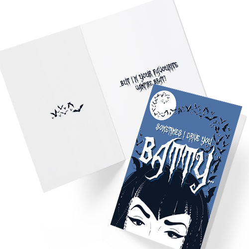A large glossy A5 greeting card designed in a vintage horror poster style. The cover features a tired mum with bats flying over her head and the phrase "Sometimes I drive you batty...". Inside reads "But I’m your favourite vampire brat", with UK or US spelling options. Comes with a white envelope.