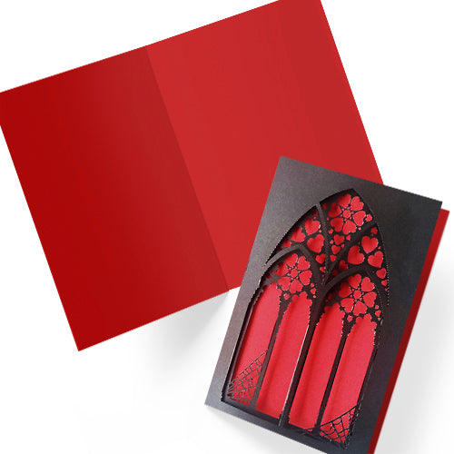 Handmade A5 black greeting card with layered gothic arch design and red heart cut-out revealing soft pink interior. Blank inside with envelope included. Perfect for gothic weddings, anniversaries, or alternative Valentine’s Day.