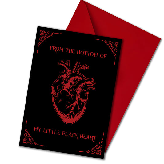 Glossy black A5 card with a lifelike red Victorian heart illustration. Text says “From the Bottom of My Little Black Heart.” Includes envelope. Perfect for goth and alternative romance.