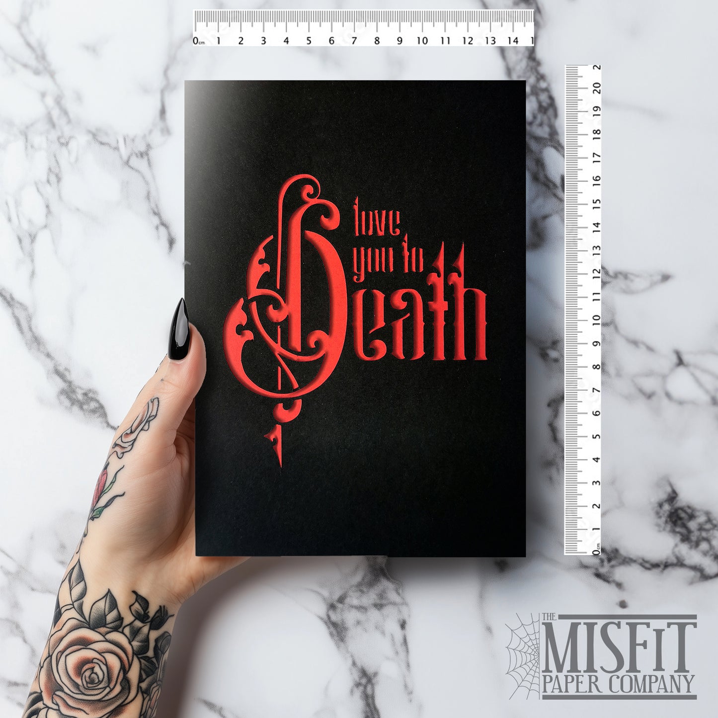 Handmade A5 gothic romance card with “Love You to Death” cut from black outer layer, revealing a deep red interior. Includes envelope and blank inside for your own message. Perfect for weddings, anniversaries, or spooky Valentine’s Day gifting.