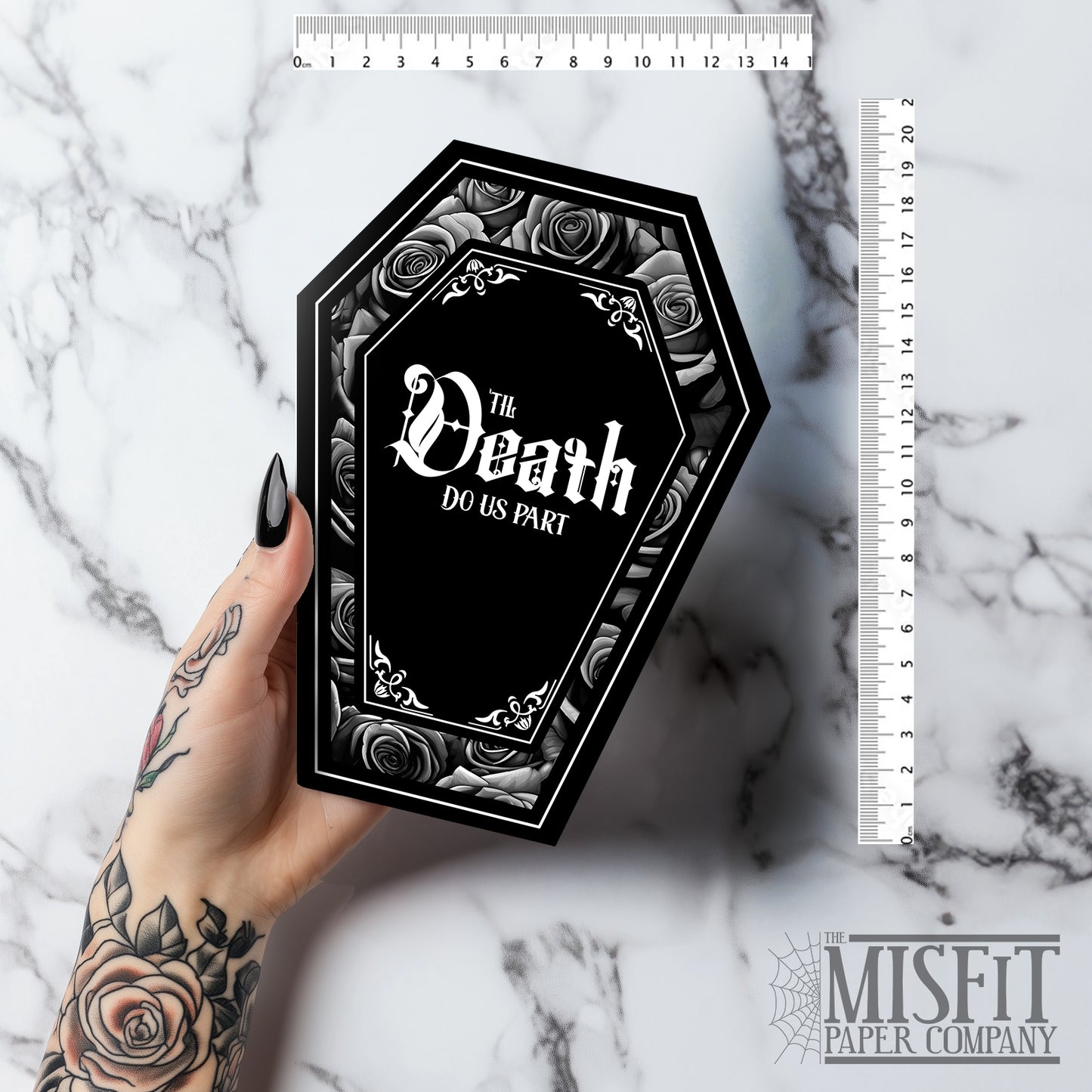Coffin-shaped gothic wedding or anniversary card with the phrase "Til Death Do You Part" or "Til Death Do Us Part" on a black background, surrounded by monochrome roses. Subtle black and white rose inner print and a black envelope.