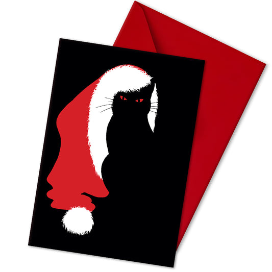 A5 glossy portrait Christmas card on black with minimalist red Santa hat and white trim forming space for a black cat silhouette with red eyes. Clean graphic style. Includes red envelope. Blank inside.