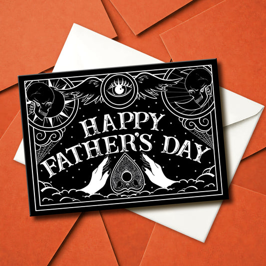 A5 gothic Father’s Day card featuring black and white Ouija board design with ornate “Happy Father’s Day” lettering and planchette detail. Blank inside with envelope. Ideal for witchy, spooky, or alternative dads.