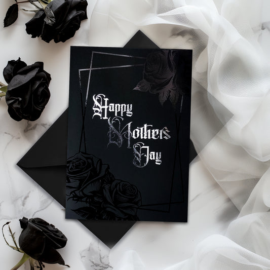 Handmade gothic Mother’s Day card with black foil rose frame and silver lettering on thick black cardstock, with white interior and elegant rose motif.