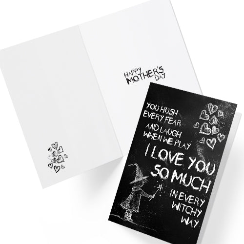 A black A5 greeting card with a chalkboard-style background, featuring a hand-drawn witch illustration casting a spell with floating love hearts. A sweet rhyming poem is written in chalk-style lettering. The card reads Happy Mother's Day inside and comes with an envelope.