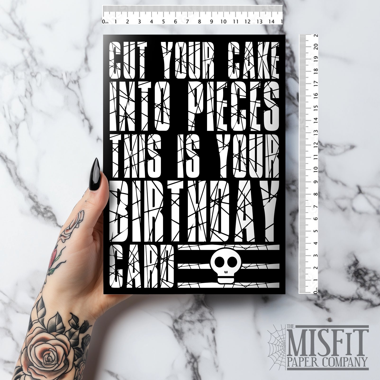 Glossy black birthday card with bold white text parodying Papa Roach lyrics: “Cut your cake into pieces, this is your birthday card.” Perfect for emo, punk, and alternative music fans. A5 size, blank inside, includes envelope.