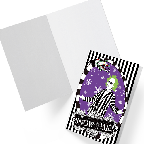 A5 glossy portrait Christmas card with black and white striped frame, purple background and snowflakes. Green-haired Beetlejuice in pinstripe suit, sandworm at top, banner reads “It’s Snow Time!”. Includes purple envelope. Blank inside.
