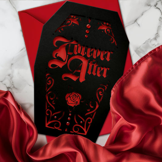 Intricately cut from rich black card with blood-red backing, this dramatic design features a blooming red rose and sparkling red gems for a touch of macabre glamour.
