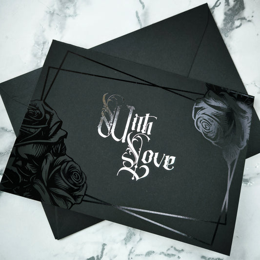 Black Rose Foiled With Love Card features deep black foiled roses and ornate silver foiled Victorian lettering reading “With Love.” 